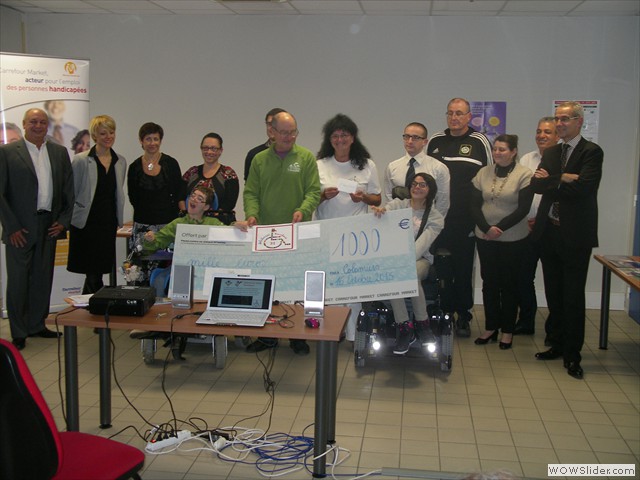 Remise de chèque à l'association Y Arrivarem